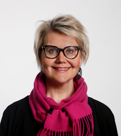 Mirjamaija Mikkilä-Erdmann lähikuvassa.