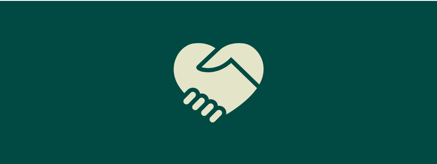 Banneri, jossa on sydämen muotoinen kuvio, joka muistuttaa kätteleviä käsiä