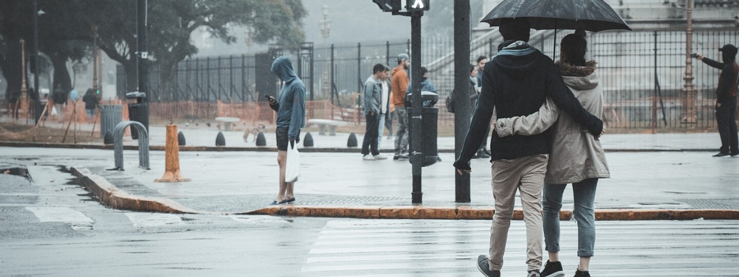 Couple walking in the rain