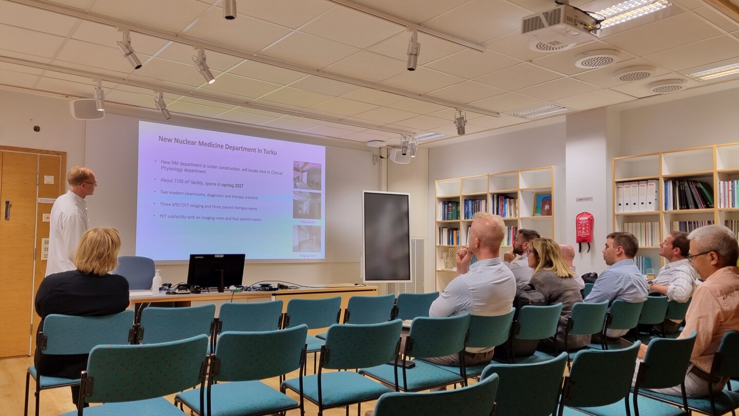 People looking at presentation