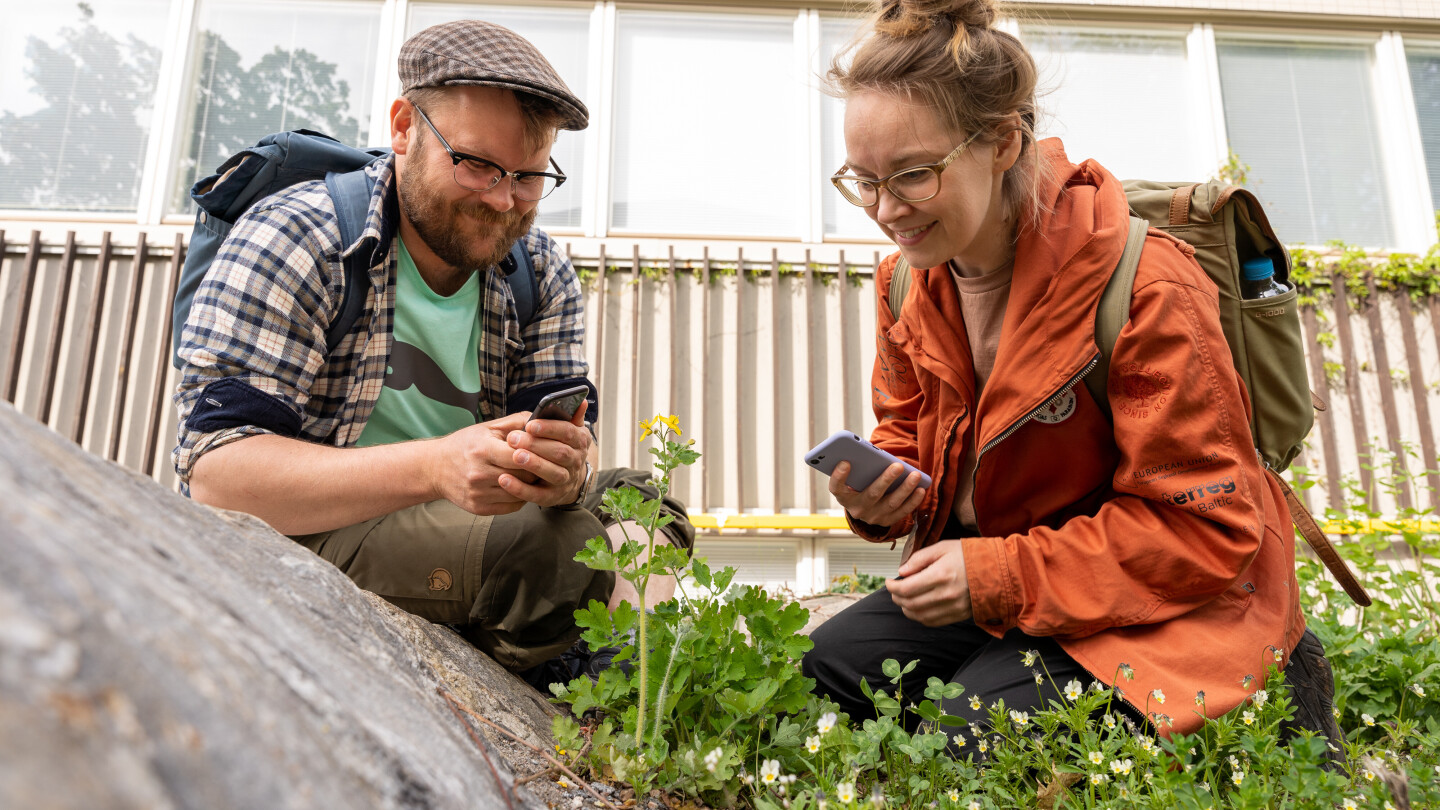 Two Bioblitz event participants  outside