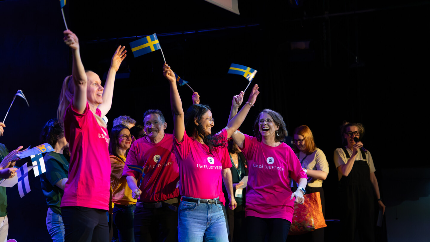 Winning team celebrating at the science contest stage