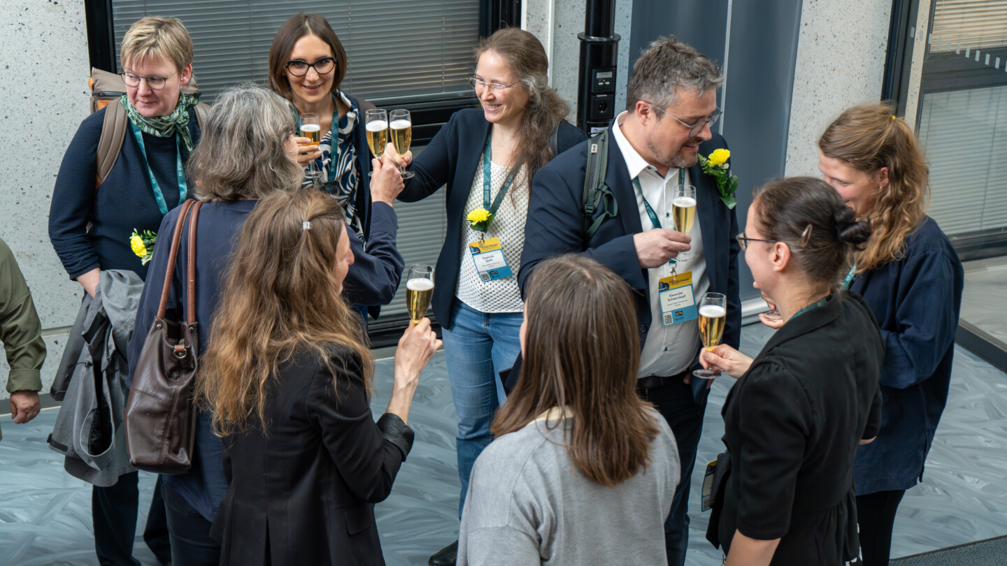 People gathering for a farewell drinks