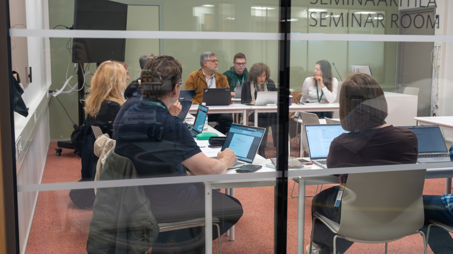 People sitting in a meeting room