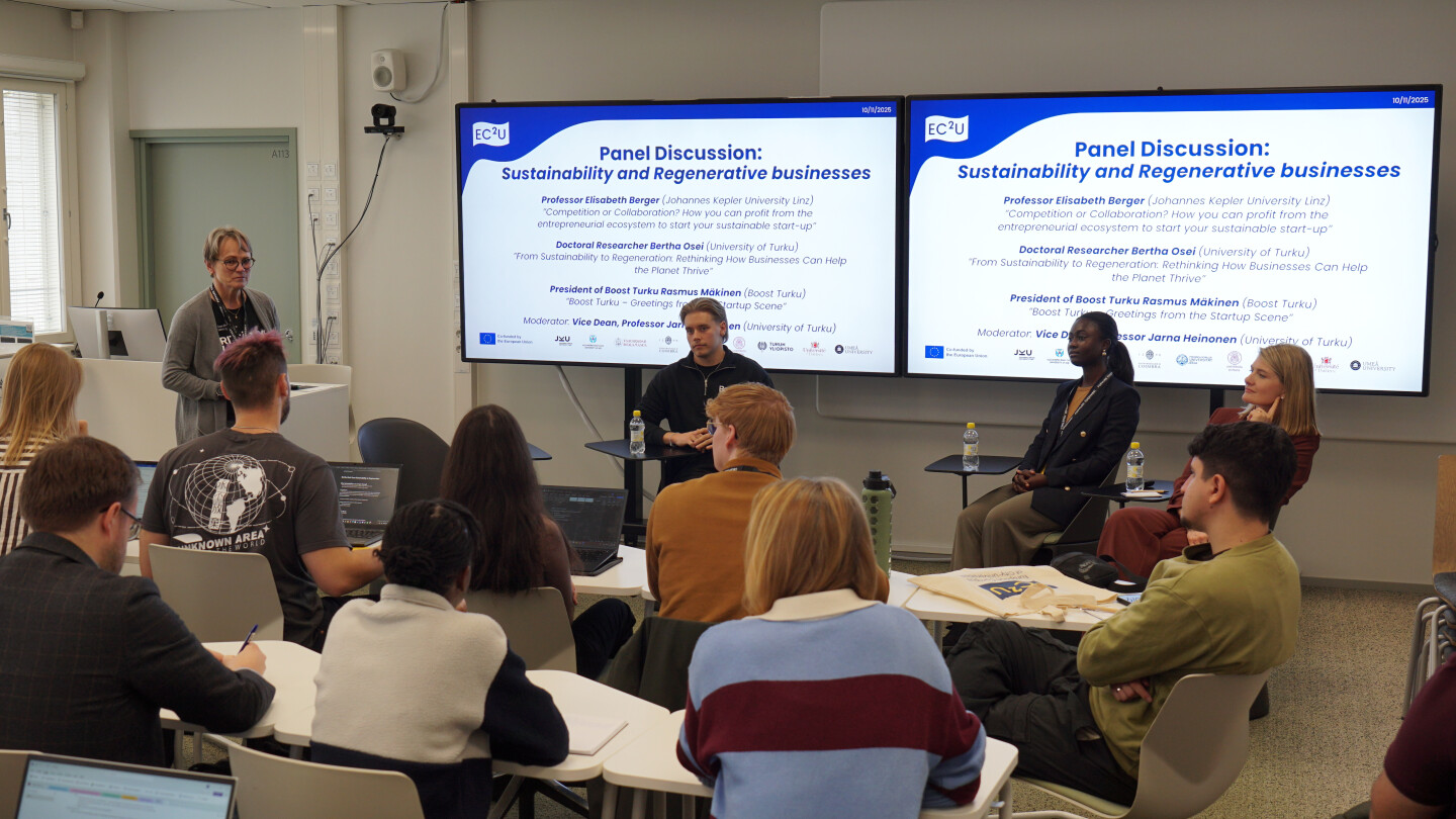 Panellists in front of the audience