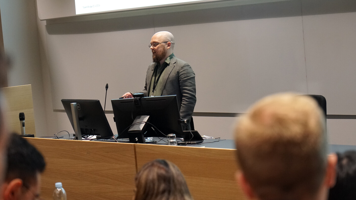 A man giving a presentation to the audience