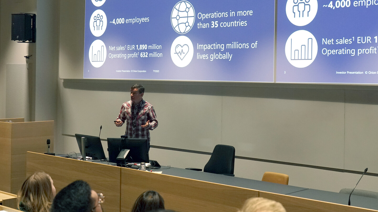 A man giving a presentation to the audience
