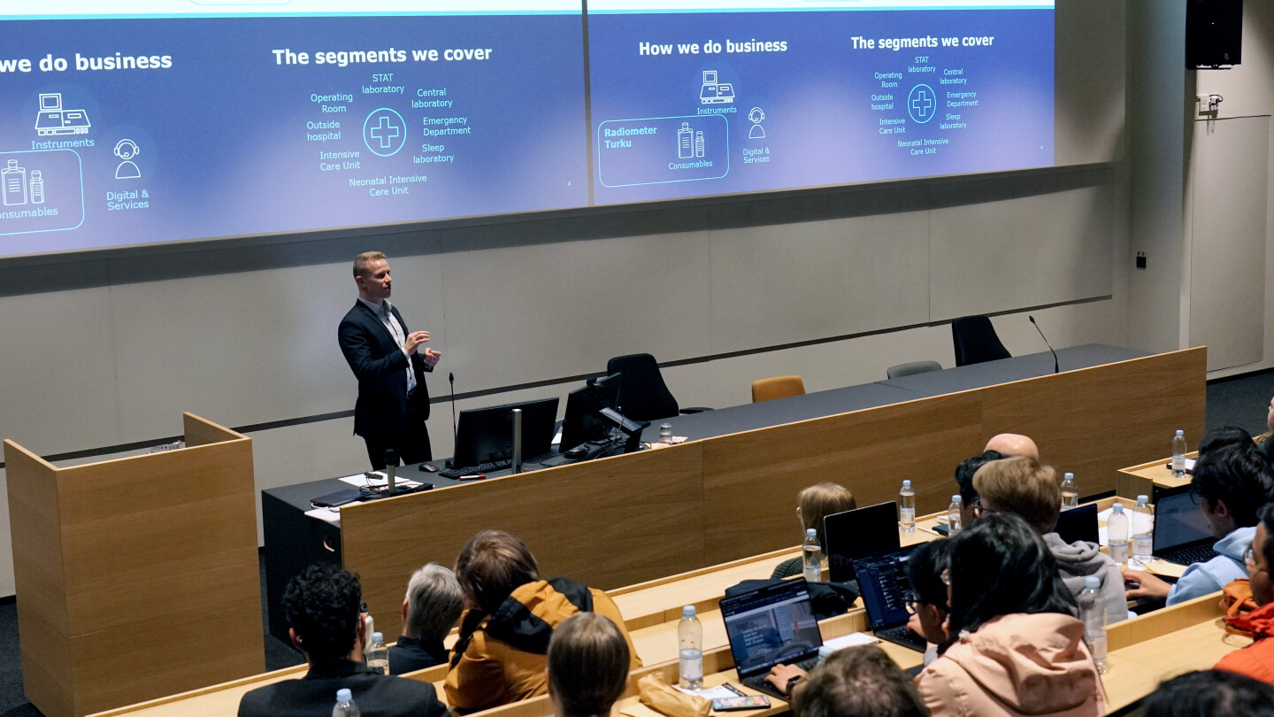 A man giving a presentation to the audience