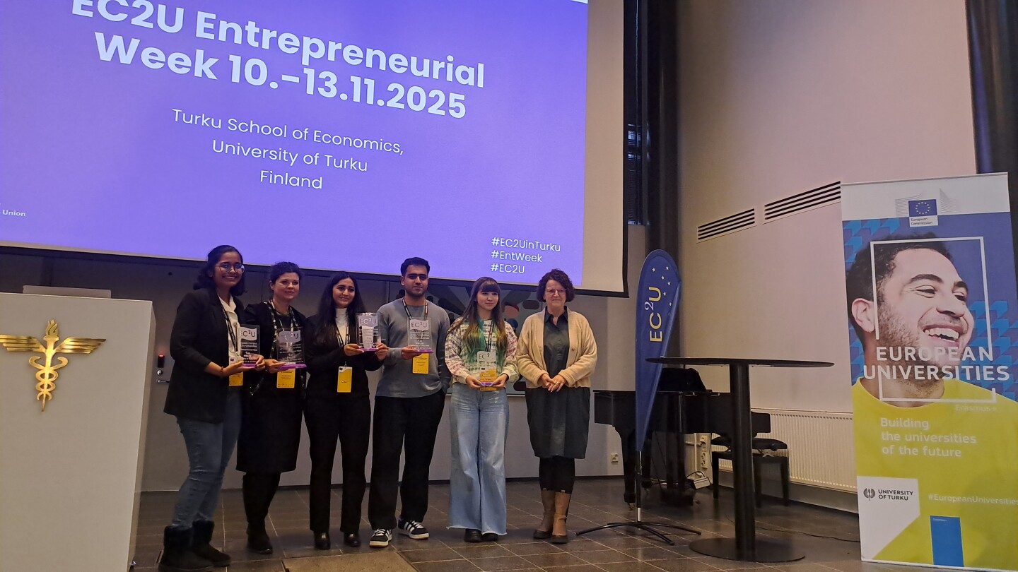 Winning team on a stage