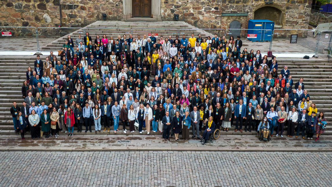 aerial photo of the forum participants outside the Turku Cathedral