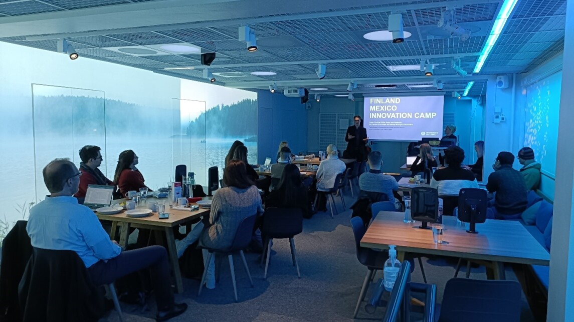 Innovation camp teams in a workshop.