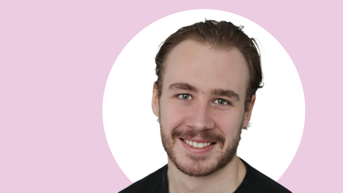 A photo of Joshua Baggott with pink and white background.