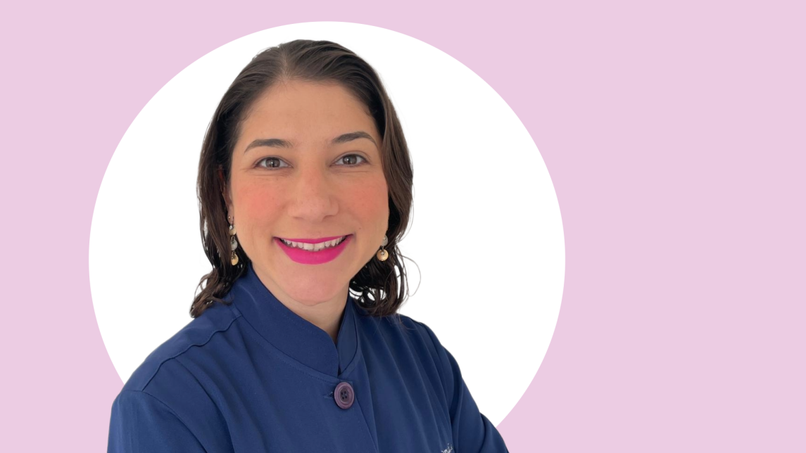 A photo of Marilia Canadas, pink and white background.