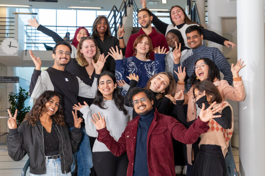 students cheering on the stairs