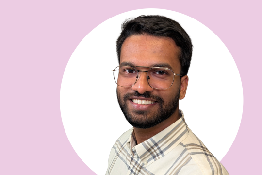 A photo of Jithin Vijayan with white and pink background.