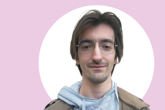 A photo of Paolo Buttazzoni, pink and white background.