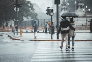 Couple walking in the rain