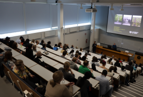 Doctoral students in a lecture hall