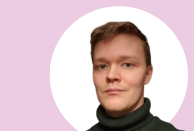 Henri Avela in close-up, with light pink and white in the background.